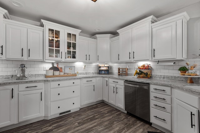 kitchen featuring dishwasher, glass insert cabinets, and white cabinets