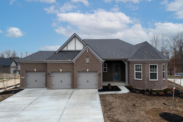 view of front of property with a shingled roof, concrete driveway, an attached garage, fence, and brick siding