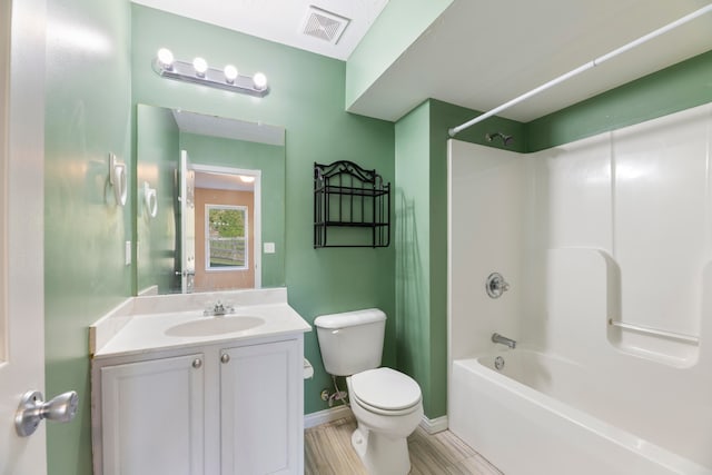 full bathroom with vanity, toilet, and shower / bathtub combination