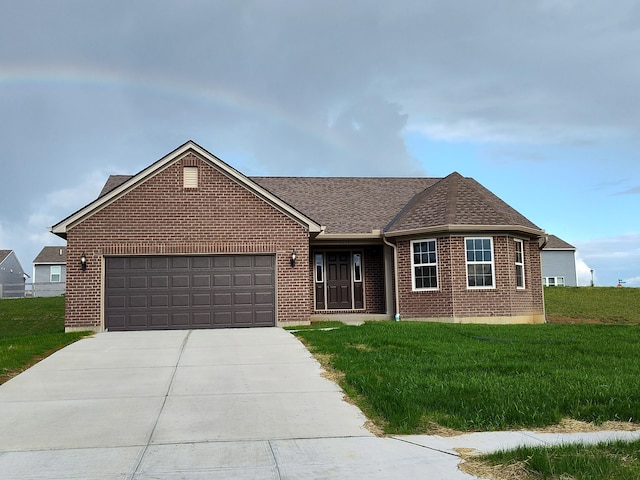 single story home featuring a garage and a front lawn