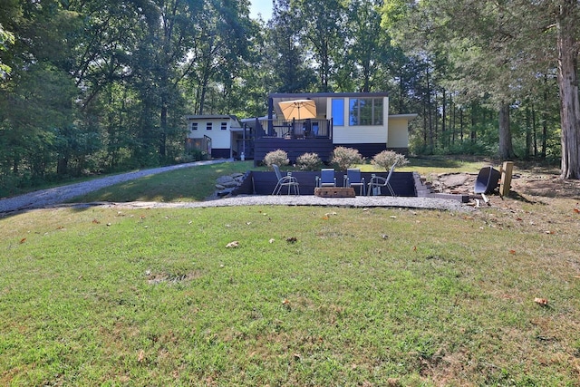 view of yard with a deck