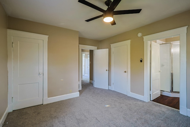 unfurnished bedroom featuring carpet flooring and ceiling fan