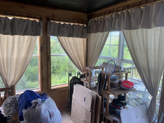 interior space featuring a sunroom and plenty of natural light