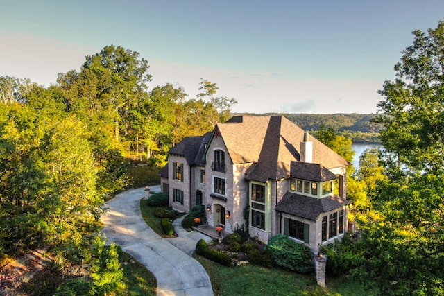 birds eye view of property featuring a water view