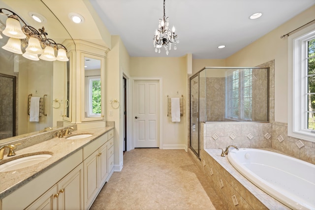 bathroom with vanity, separate shower and tub, and plenty of natural light