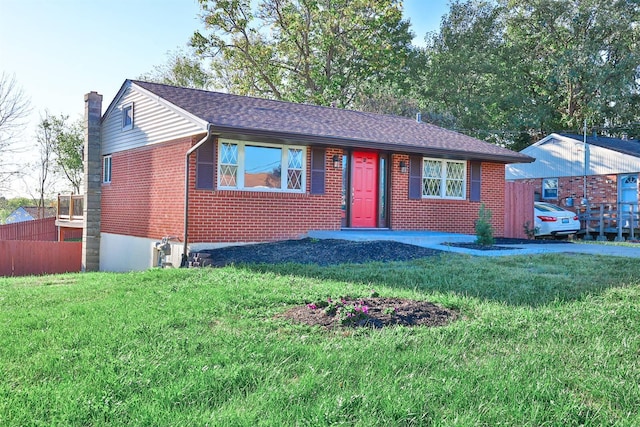 ranch-style house with a front lawn