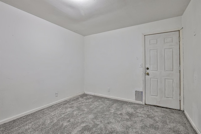 unfurnished room with light colored carpet