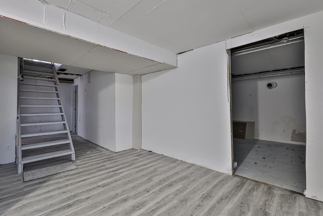 basement with light wood-type flooring