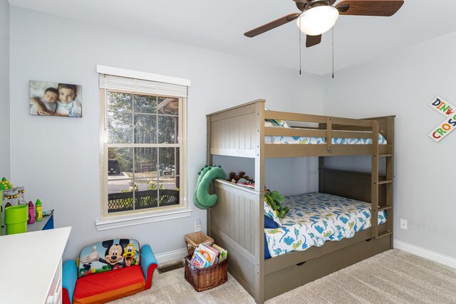 bedroom featuring ceiling fan and carpet floors