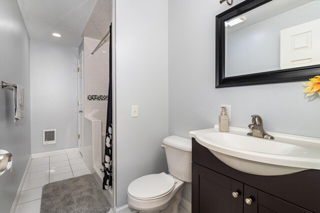 bathroom with walk in shower, tile patterned flooring, heating unit, toilet, and vanity