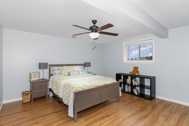 bedroom featuring ceiling fan and light wood-type flooring