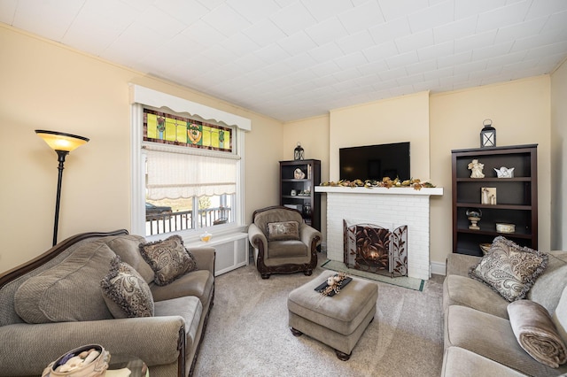 living room with a fireplace and carpet flooring