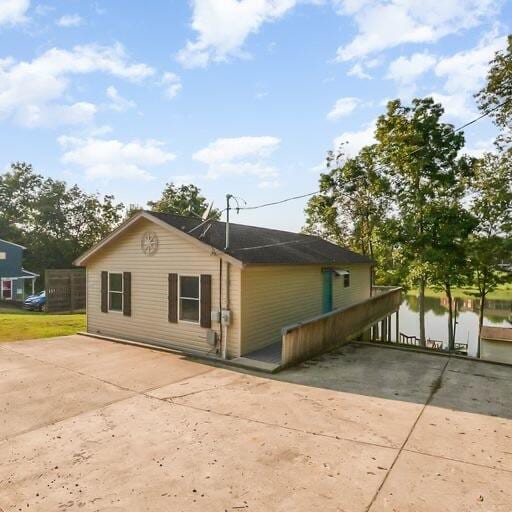 view of side of property with a water view