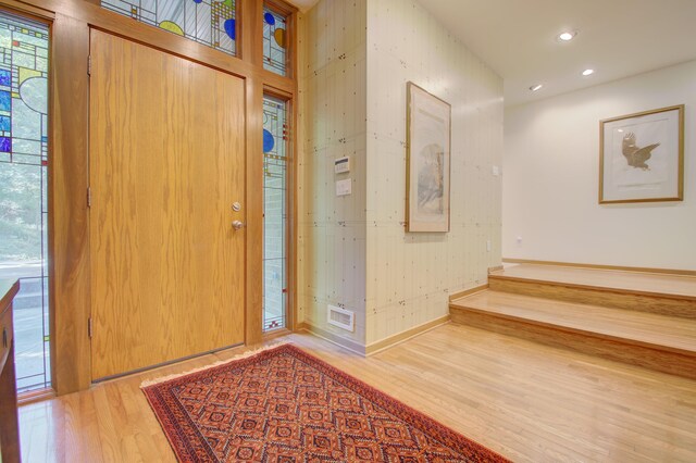 foyer with hardwood / wood-style flooring