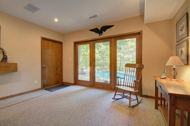 living area with carpet flooring