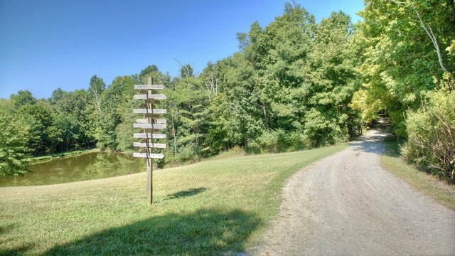 view of road featuring a water view