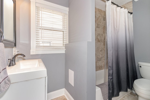 full bathroom featuring vanity, toilet, and shower / bath combo