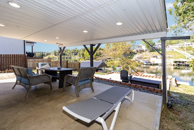 view of patio featuring a water view