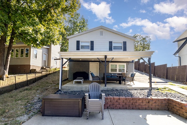 view of front of property featuring an outdoor hangout area, a patio area, and ceiling fan