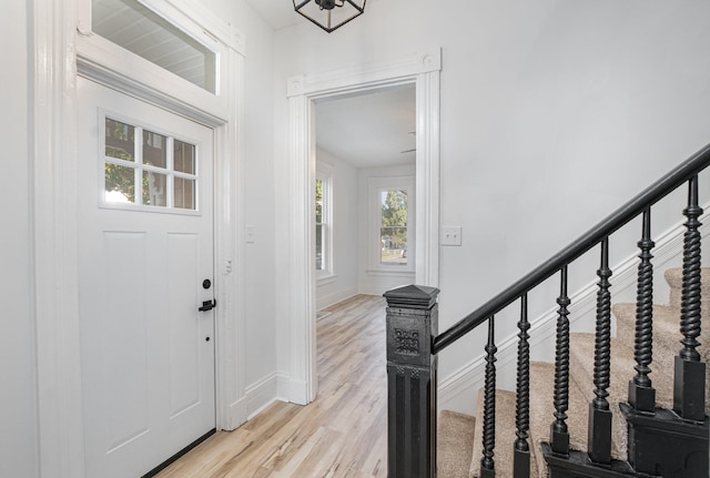 entrance foyer with light wood-type flooring