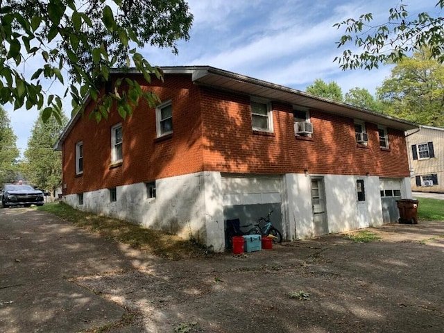 view of home's exterior featuring a garage