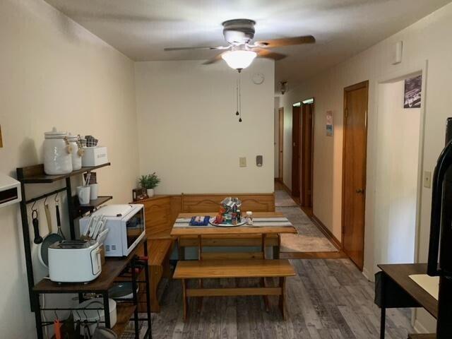 105 Kelly Ct, Owenton, KY 40359 - dining room with a ceiling fan and wood finished floors