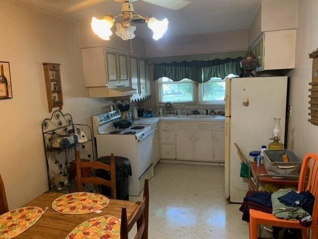 105 Kelly Ct, Owenton, KY 40359 - kitchen featuring a ceiling fan, white cabinetry, white appliances, light countertops, and light floors