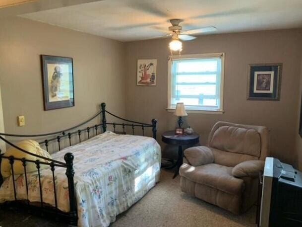 bedroom with carpet flooring and ceiling fan