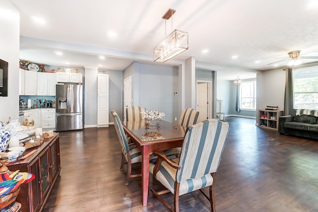 dining area featuring dark wood-type flooring and ceiling fan