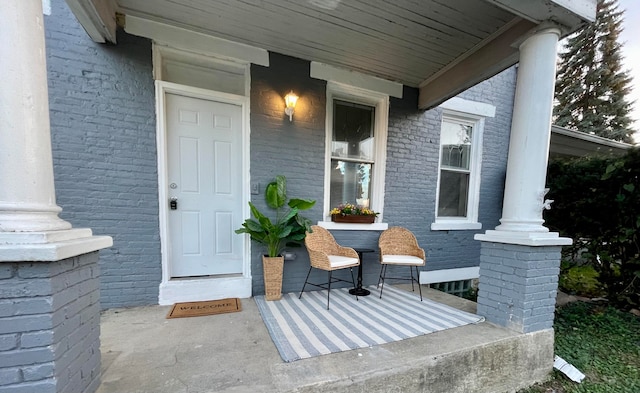 entrance to property with a porch