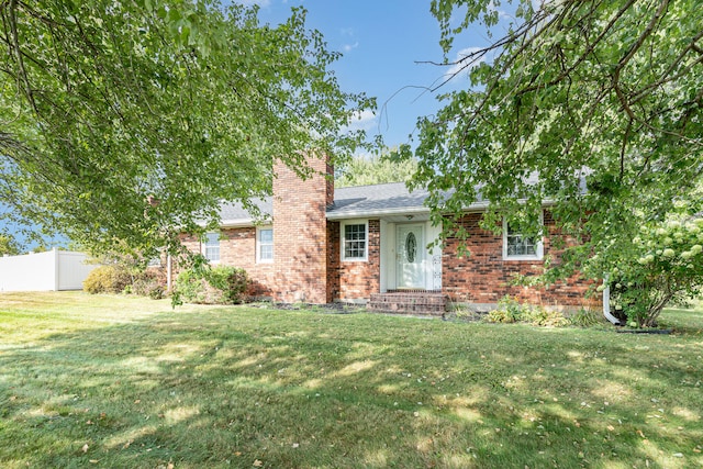 view of front of property with a front lawn