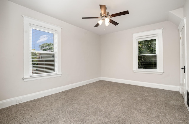 spare room featuring carpet flooring and ceiling fan