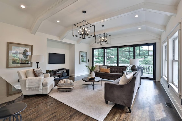 living room with lofted ceiling with beams, dark hardwood / wood-style flooring, and a wealth of natural light