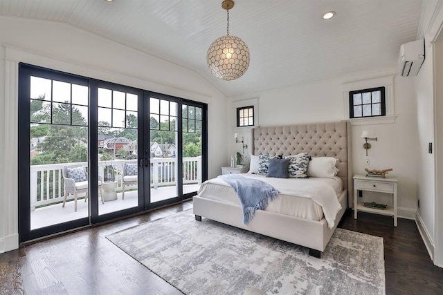 bedroom featuring lofted ceiling, an AC wall unit, dark hardwood / wood-style flooring, and access to outside