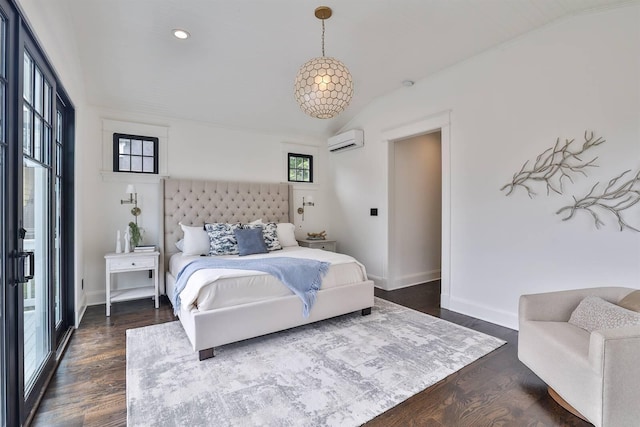 bedroom with dark wood-type flooring, a wall mounted AC, and vaulted ceiling