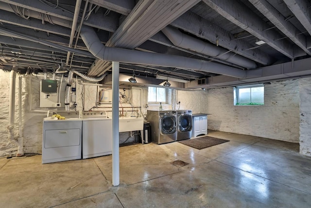 basement featuring separate washer and dryer