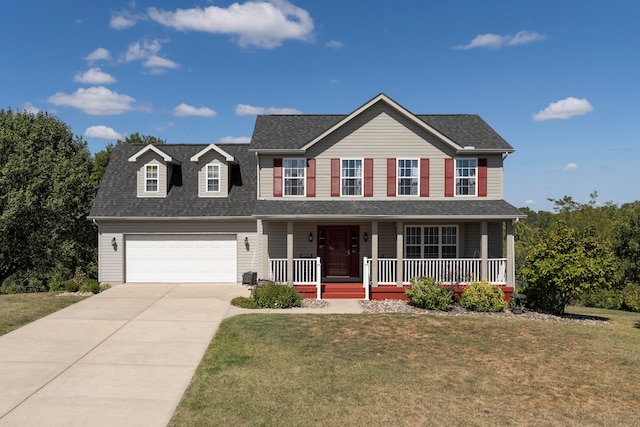 view of front of home featuring a garage, covered porch, and a front lawn