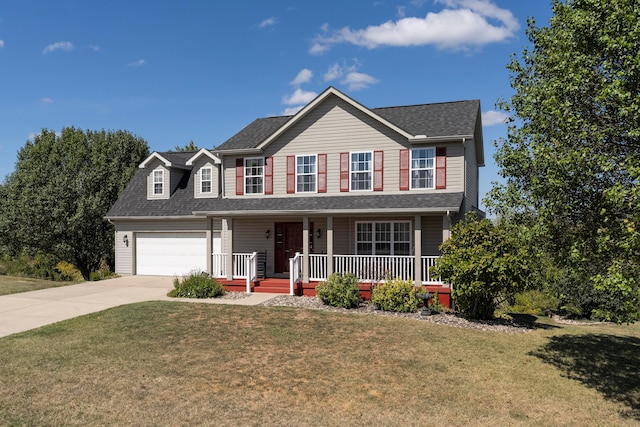 colonial inspired home featuring a front lawn, covered porch, and a garage