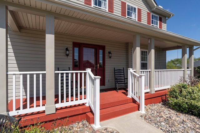 entrance to property with covered porch