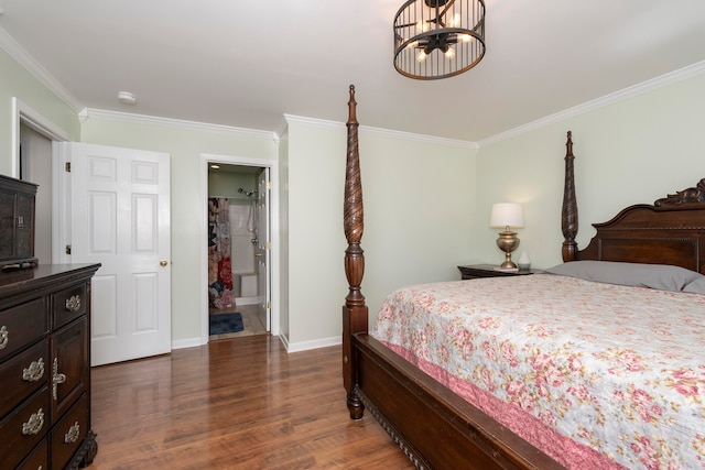 bedroom featuring dark hardwood / wood-style flooring, a chandelier, and ornamental molding