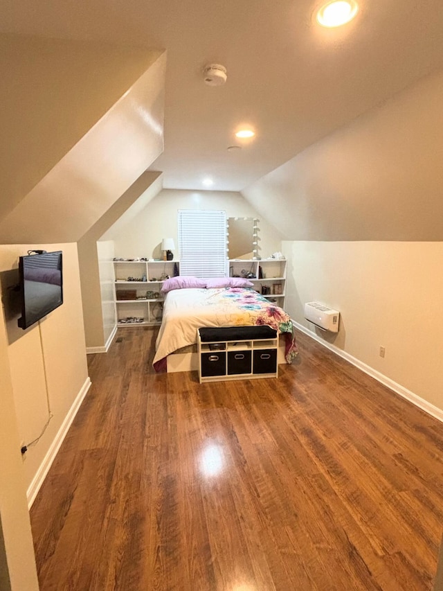 bedroom with dark wood-type flooring and lofted ceiling