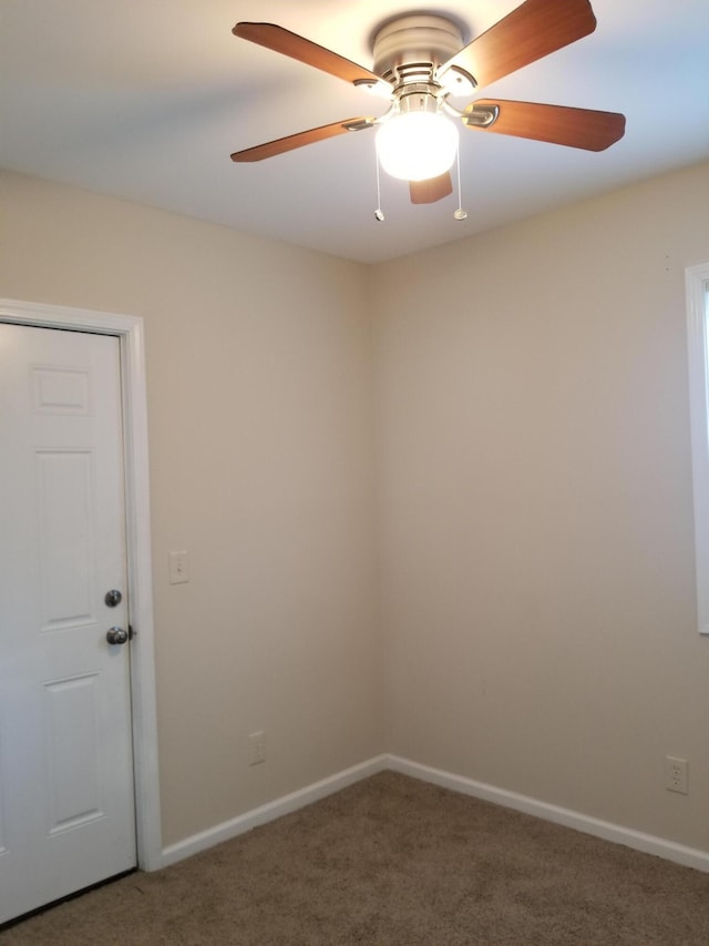 unfurnished room featuring carpet flooring