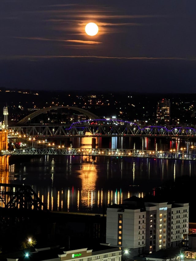 property's view of city featuring a water view