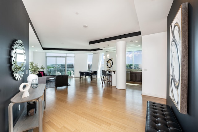 living room with light hardwood / wood-style floors