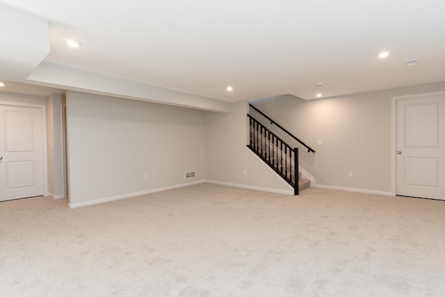 basement with light carpet