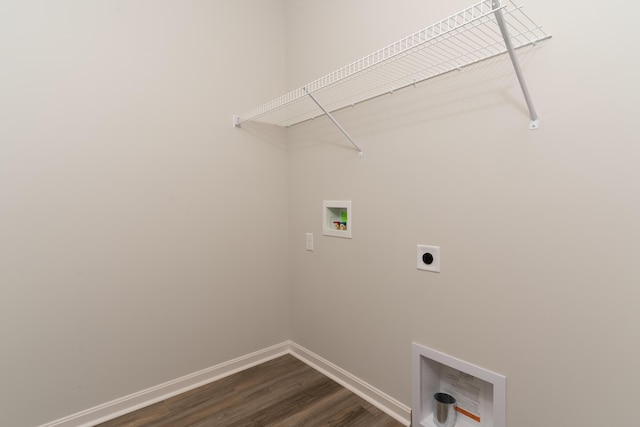 clothes washing area featuring washer hookup, hookup for an electric dryer, and dark hardwood / wood-style flooring