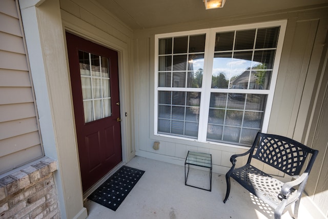 property entrance with covered porch