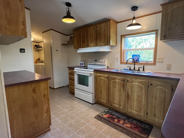 kitchen with a textured ceiling, electric stove, sink, and decorative light fixtures