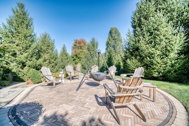 view of patio / terrace featuring a fire pit