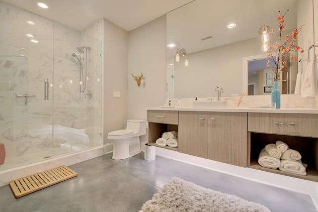 bathroom with toilet, concrete flooring, walk in shower, and vanity